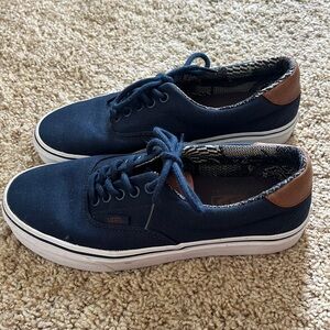 Like new navy blue boat vans with leather tongue. Women’s size 8.5